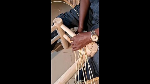 Rattan Weaving On An Oak Bench