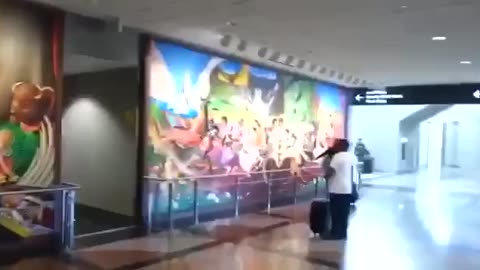 Murals at the Satanic airport in Denver Colorado