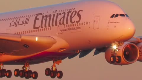 Various landings of the Airbus A380 of Emirates Airlines at sunset