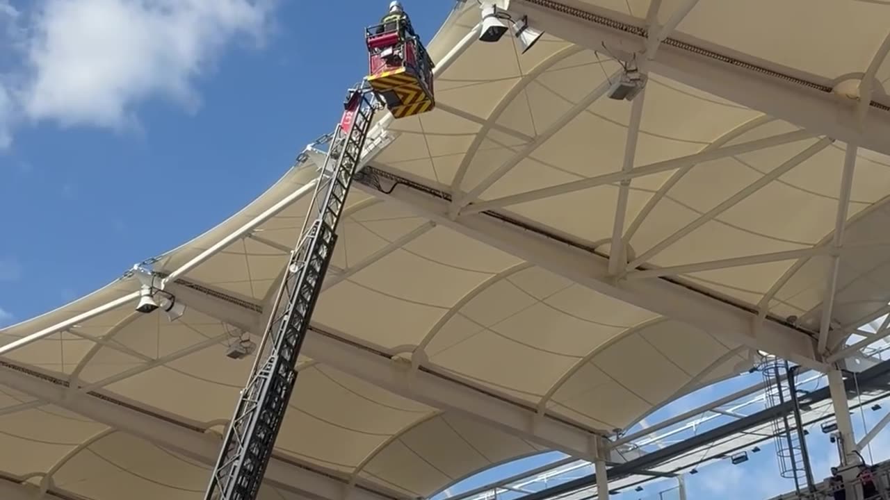 Fireman Rescue Parachutist Caught on Stadium During Rugby Game