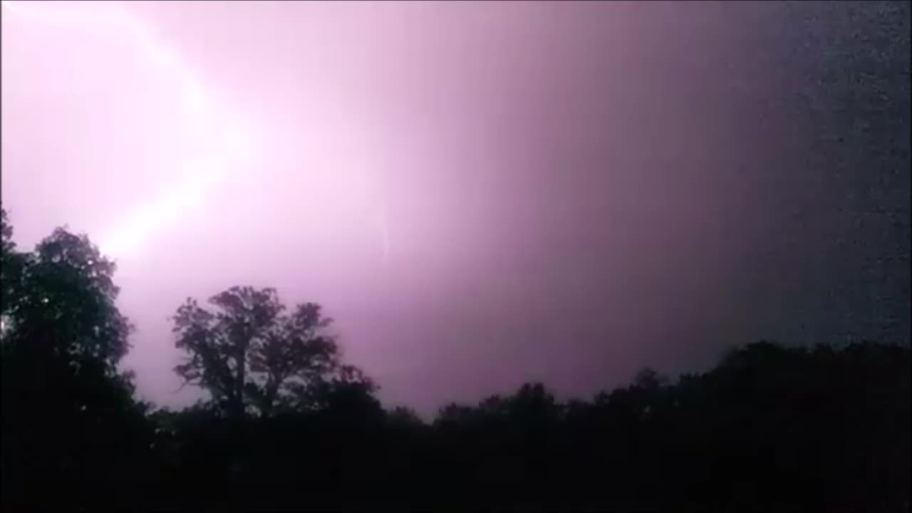 Huge bolt of lightning strikes in front and behind