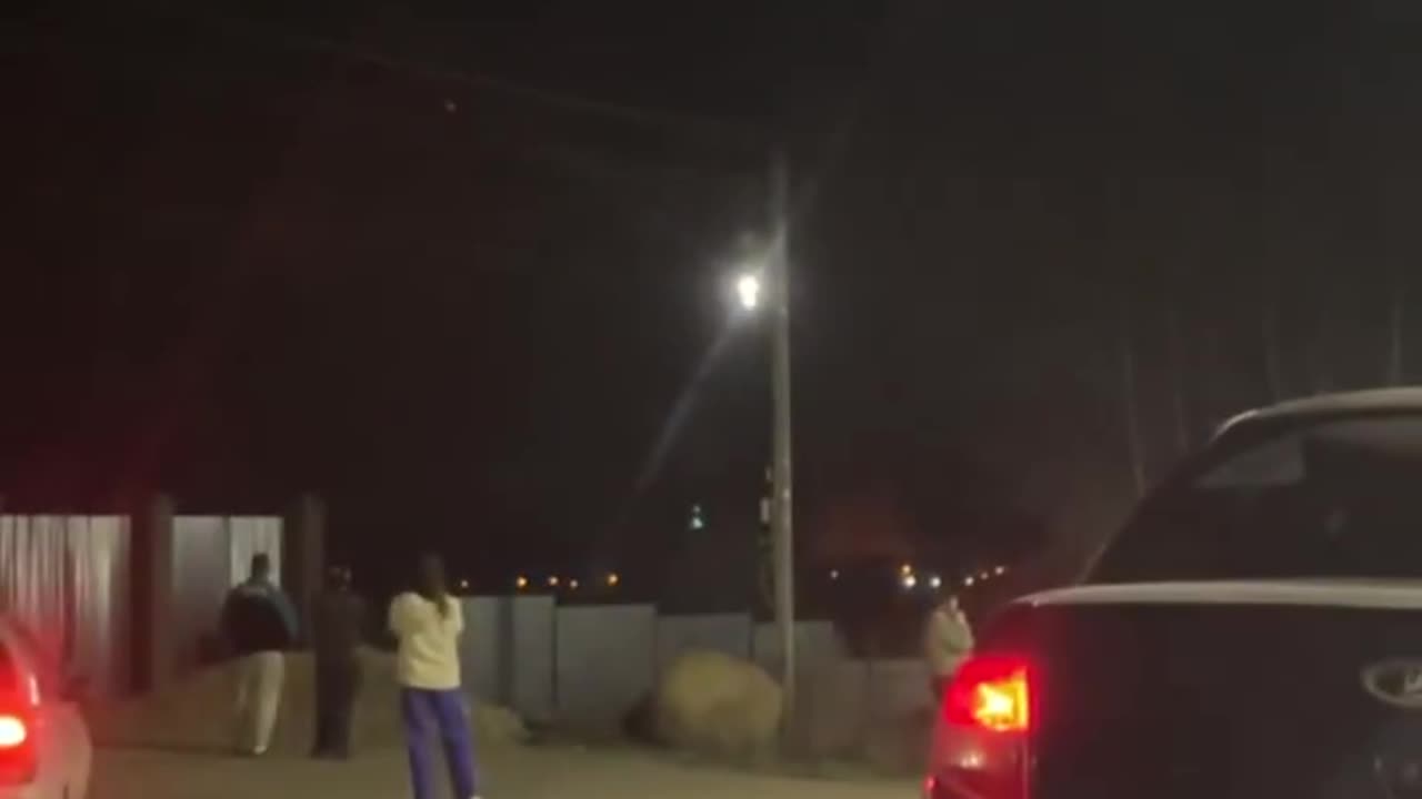 People Gather to Watch As Munitions Plant Continues to Put On a Show into It's 2nd Night