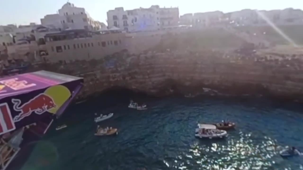 360 ' Cliff Diving From a Rocky Ledge in Italy