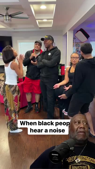A GROUP OF BLACK PEOPLE TALKING AND THEN THEY HEAR A NOISE