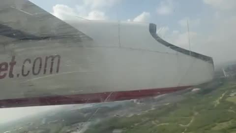 Video of wheel getting detached from aircraft by passenger.