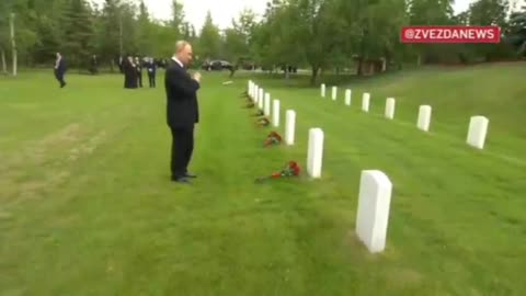 Putin laying flowers at the graves of Russian pilots in Alaska (after Peace Talks)