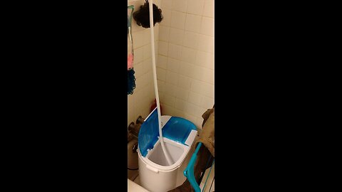 portable washer dryer in use in apartment vs 3 pair of jeans