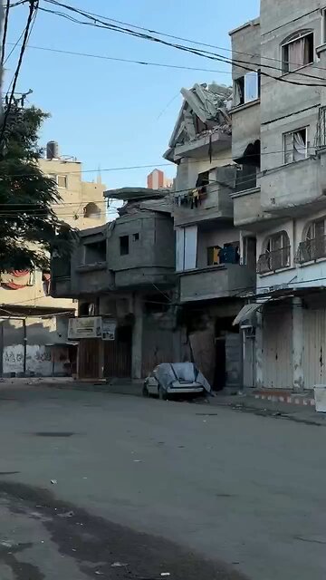 Footage of an Israeli airstrike on a building in the Al-Bureij refugee