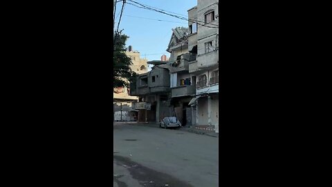 Footage of an Israeli airstrike on a building in the Al-Bureij refugee