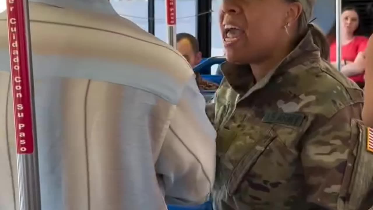 Military woman takes up for woman and baby on bus