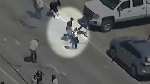 R A W S A L E R T S - 🚨#BREAKING： Watch as an anti-ICE protester opened fire on Federal ICE agents