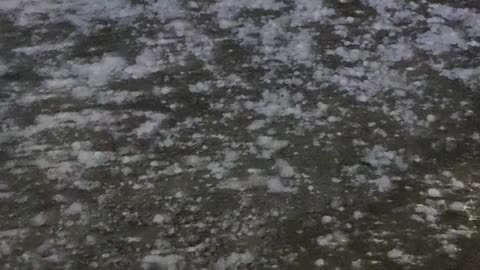 Hard Cooler Protects Head In Hail Storm