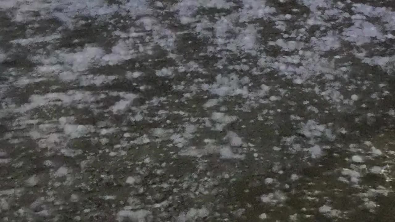Hard Cooler Protects Head In Hail Storm