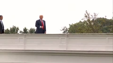 President Trump Takes a Stroll Out on the White House Roof Top