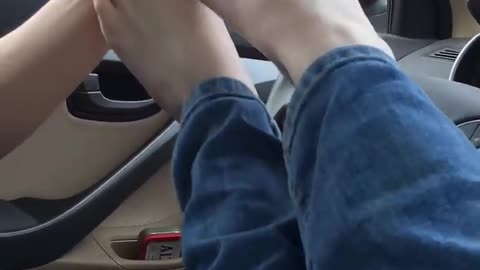 Girlfriend wanting her boyfriend to tickle her feet while driving