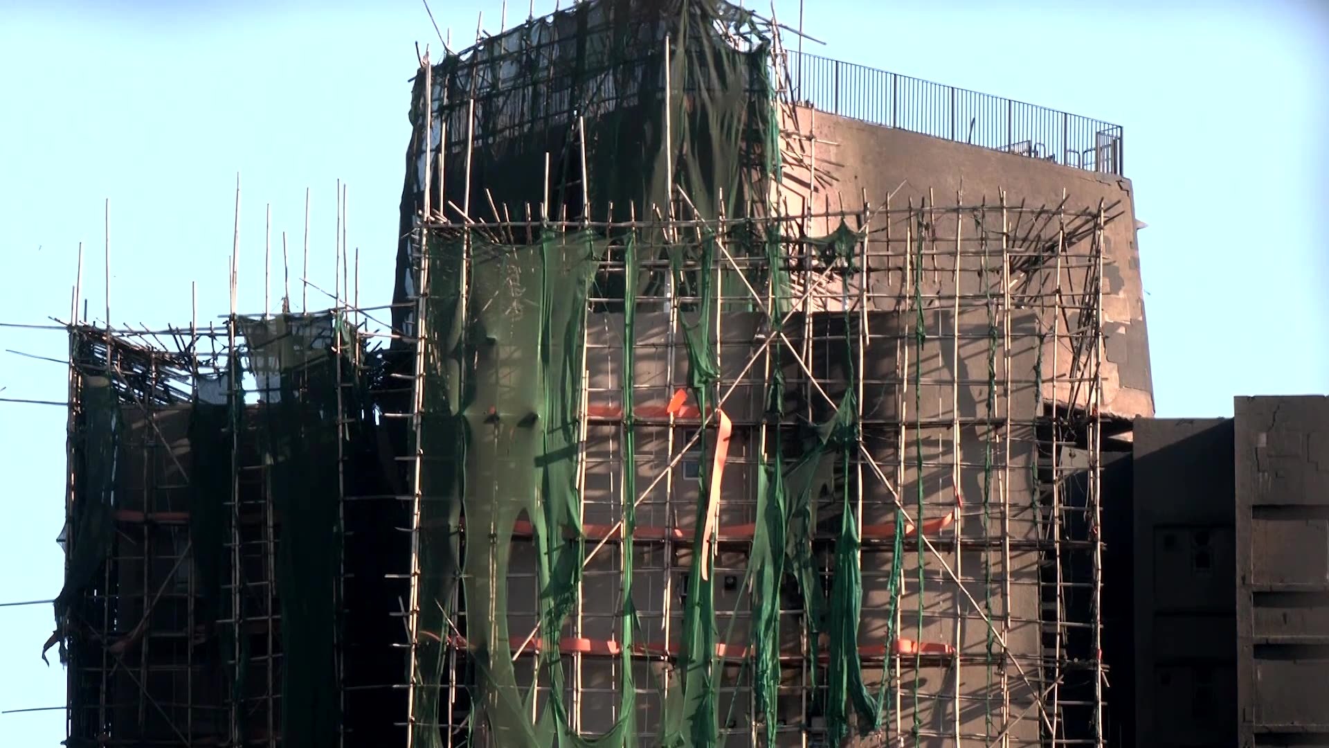 Hong Kong says mesh samples at fire-hit buildings fail standards