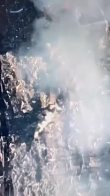 Drone footage of A Ukrainian soldier, under heavy Russian fire