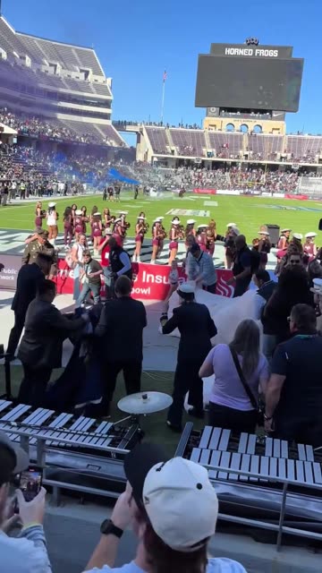 Parachutist gets caught on the field goal netting cable, falls 35 feet