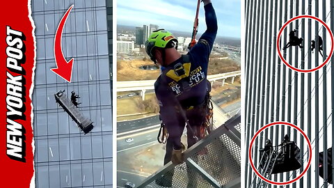 Rescue crews scale high-rise to save stranded window cleaners in Virginia