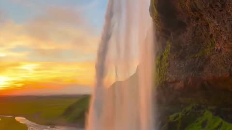 Nature’s Masterpiece 🌅💧 | Waterfall Dreams at Sunset 🌿✨