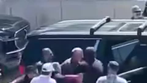 Men That Gave Signals, Along With Others Carry Charlie Kirk's Body To SUV