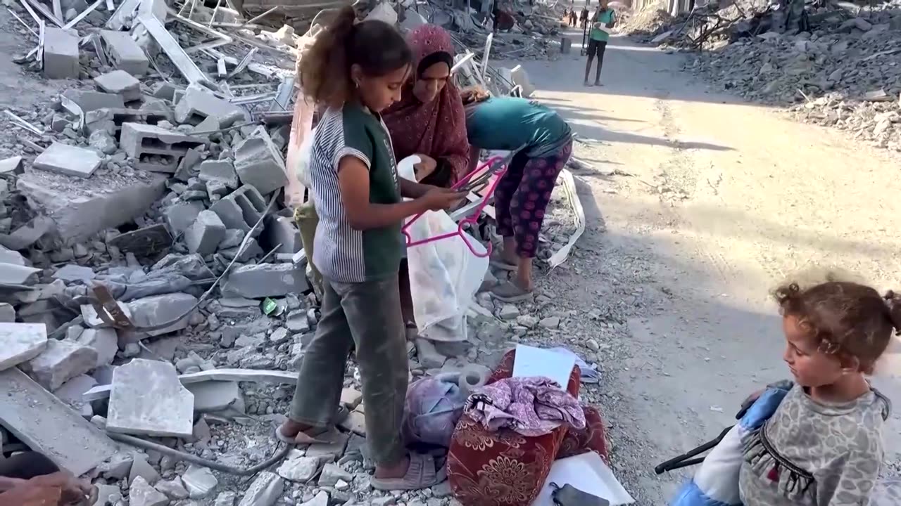 Palestinians in Gaza City keep house keys as homes lie destroyed