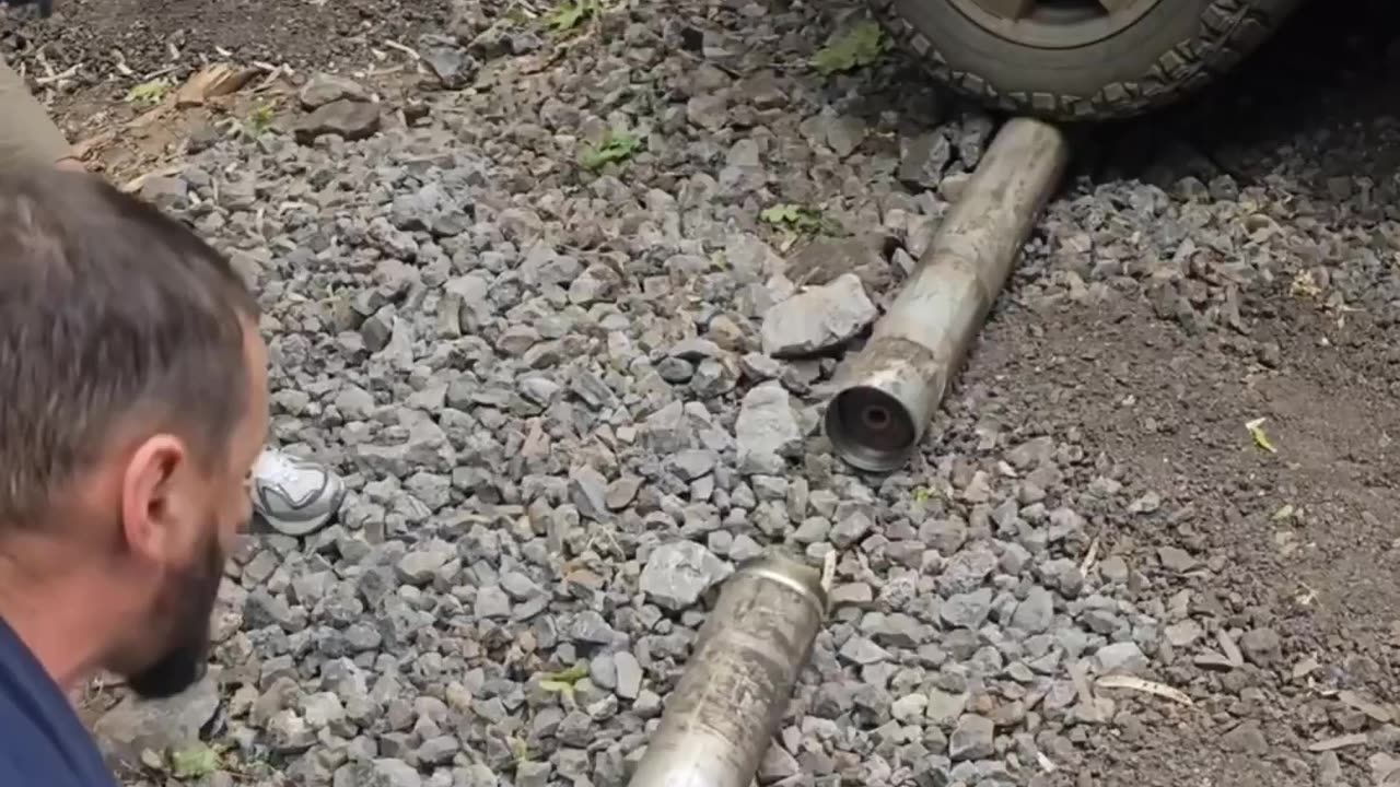 Russians Disassemble A Grad Rocket to Extract Gunpowder for Drone Bombs