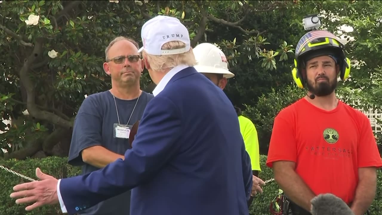 Trump Jokes with Flag Pole Installers: "Any Illegal Immigrants Here?"