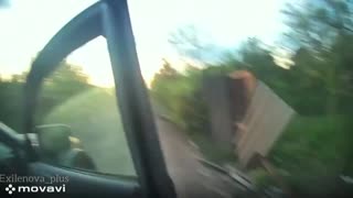Ukrainians Bail From Car, Avoiding Drone and Immediately Hopping in and Driving Away