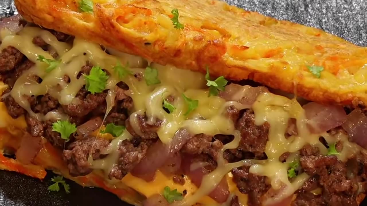 Make a dinner recipe, a potato and carrot pancake filled with beef and melted cheese,