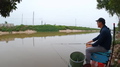 Fishing for Bream in a Serene Lakeside Spot
