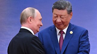 Vladímir Putin y Xi Jinping conversan amigablemente antes del inicio de la cumbre de la OCS