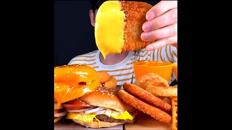 Cheese Burger with chicken nuggets, onion rings