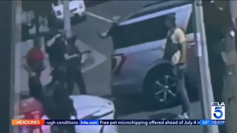 In a "targeted arrest," HSI officers smash an automobile.