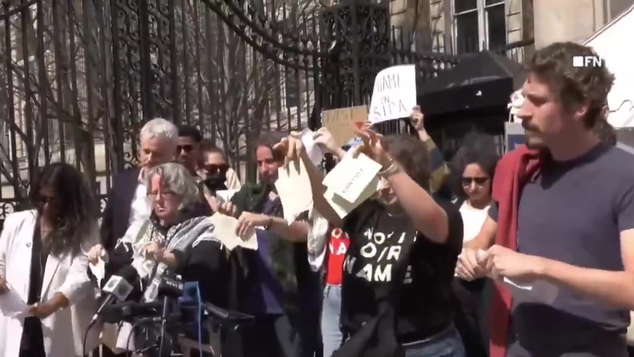 Pro-Palestine Columbia graduates rip up their diplomas to protest the Trump admin