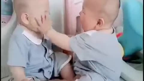 Cute baby fight