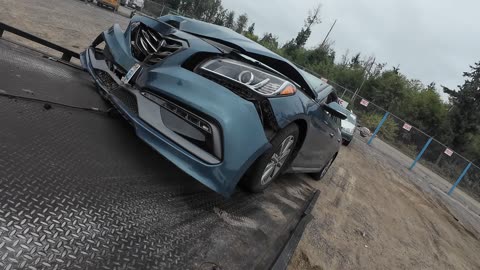 A Hyundai and a Ram 1500 towed to IAA Puyallup