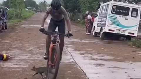 This cyclist is going to have a hell of a reflex