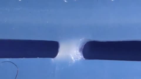 Close up of opening a water bottle