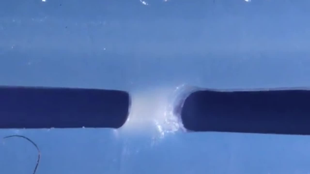 Close up of opening a water bottle