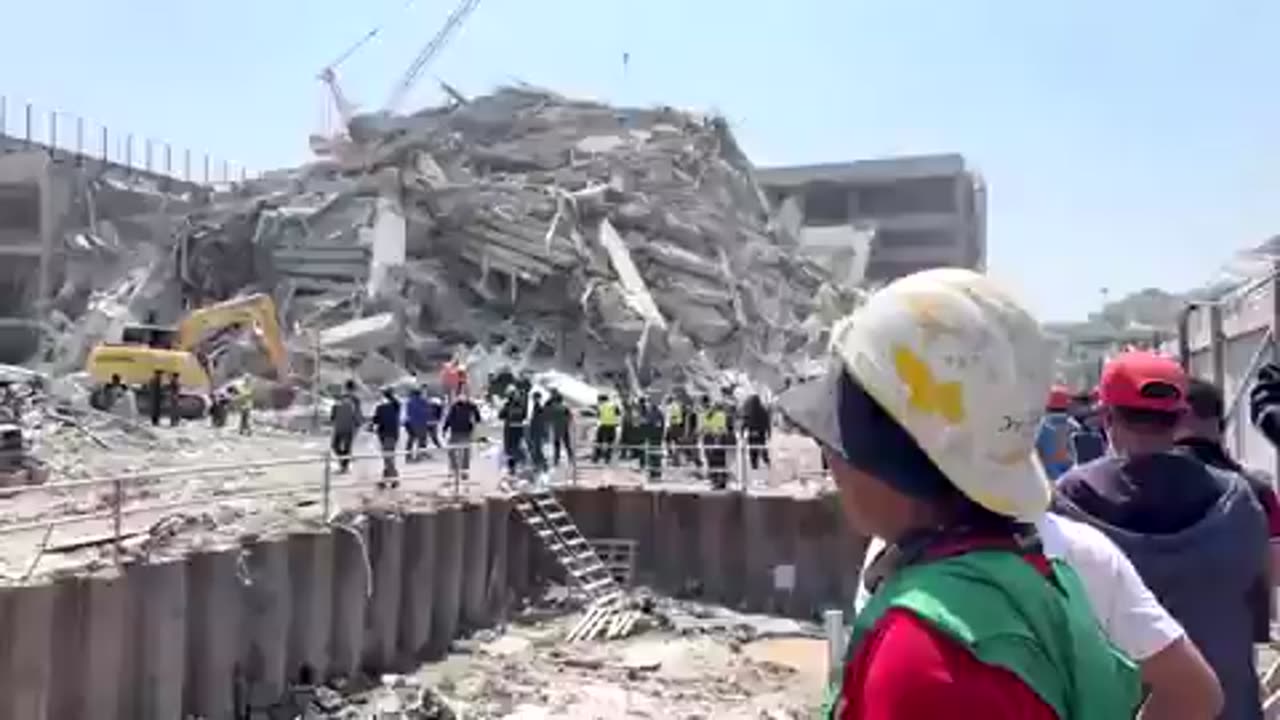 Powerful quake caused a high-rise under construction to collapse in Bangkok and led to topplings