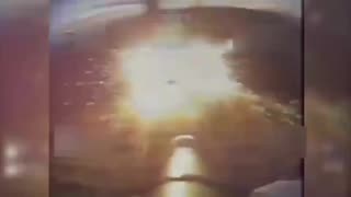 Ukrainian Drone Slams into Russian APC the Exact Moment it Hits a Mine