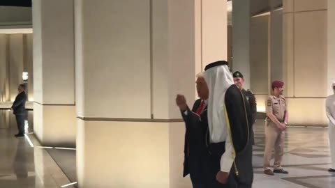 President Trump and the Emir of Qatar watch a sword dancing ceremony