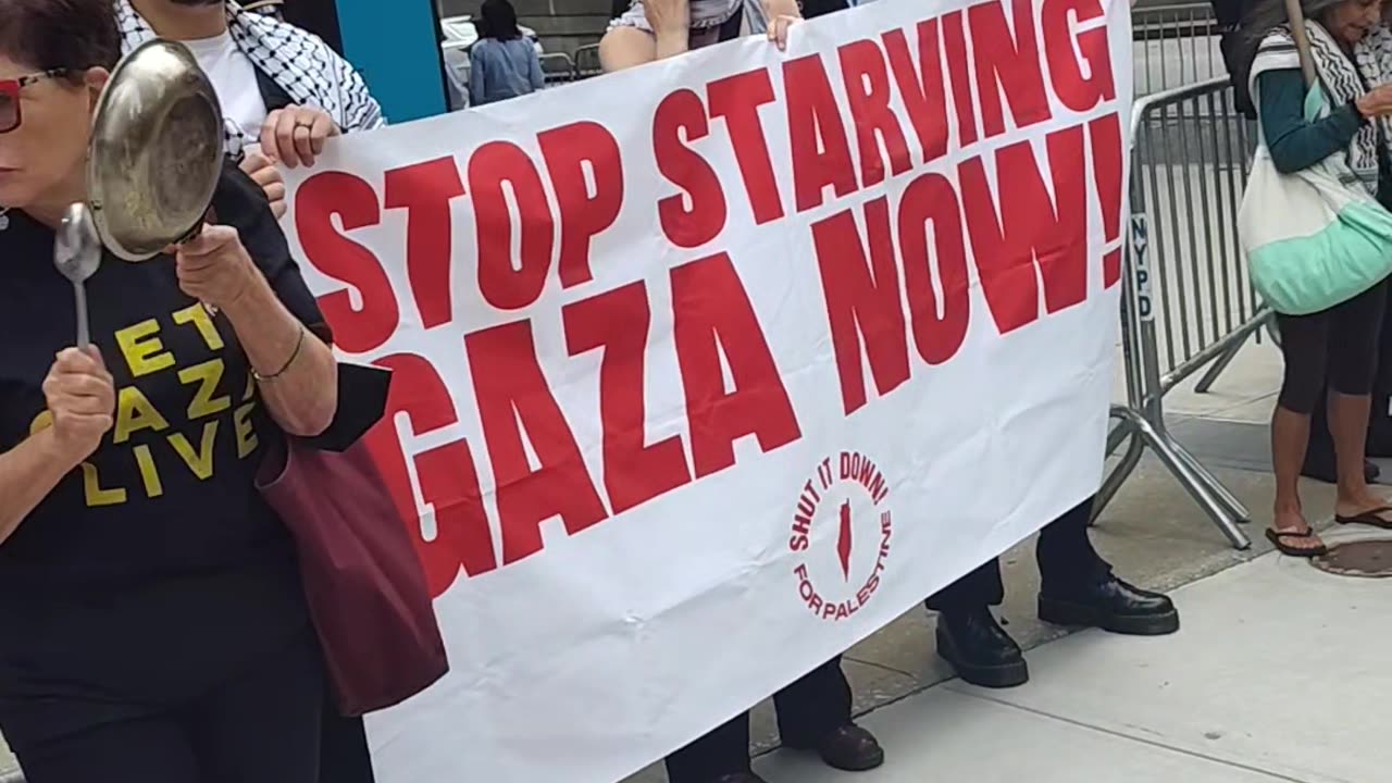 "FEED GAZA'S BABIES" demand New Yorkers.