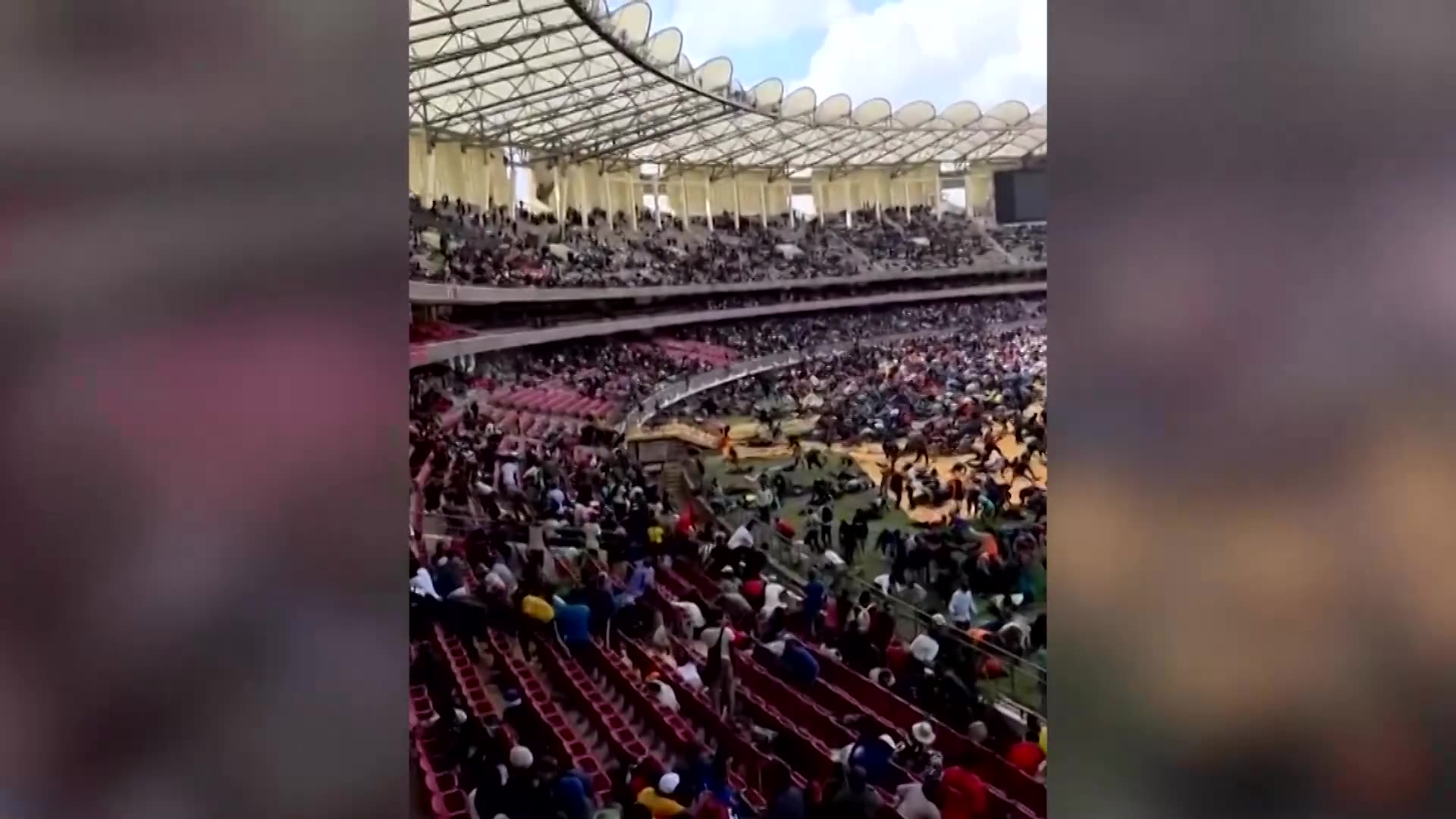 Kenyan police fire in air, lob tear gas at Odinga body viewing