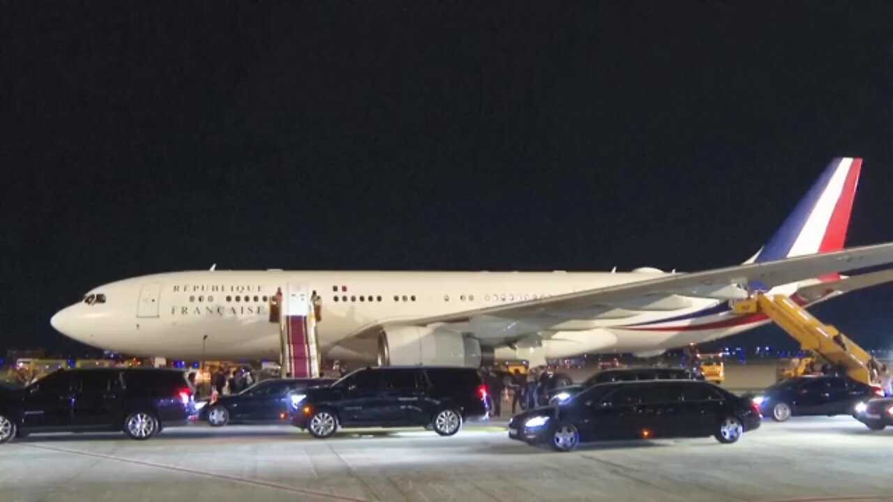 Insane moment Macron is smacked in the face by his wife as they arrive in Vietnam