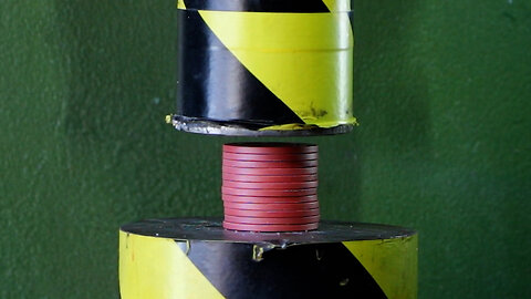 Can poker chips resist the force of a hydraulic press?