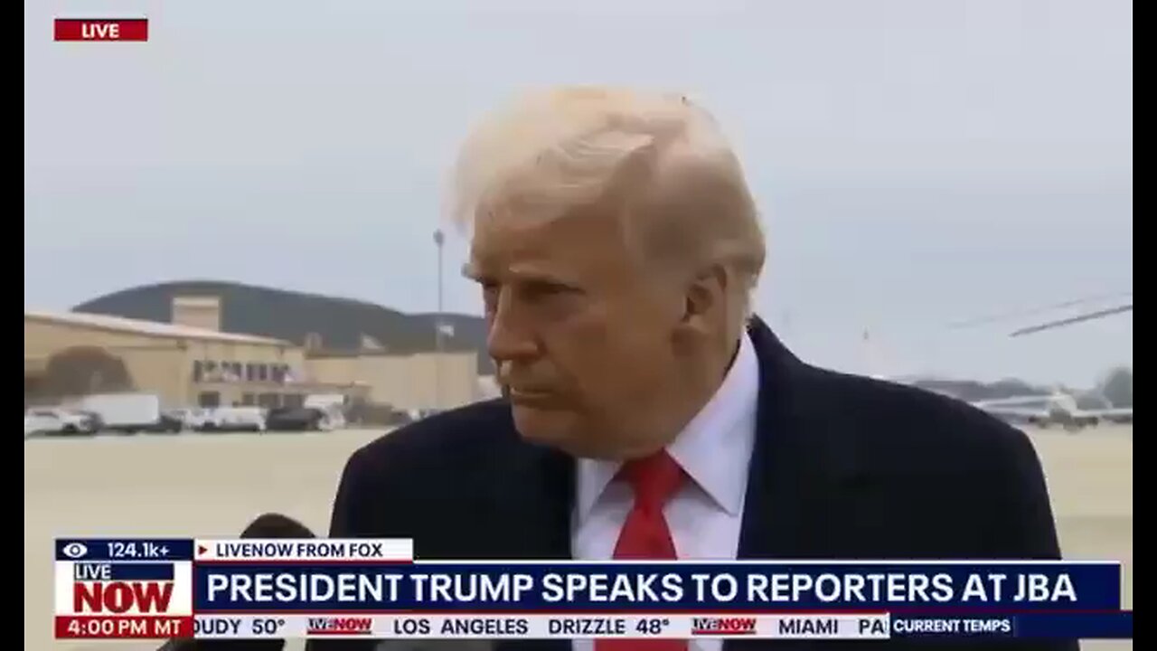 A reporter accidentally pushed a microphone in Trump's face.