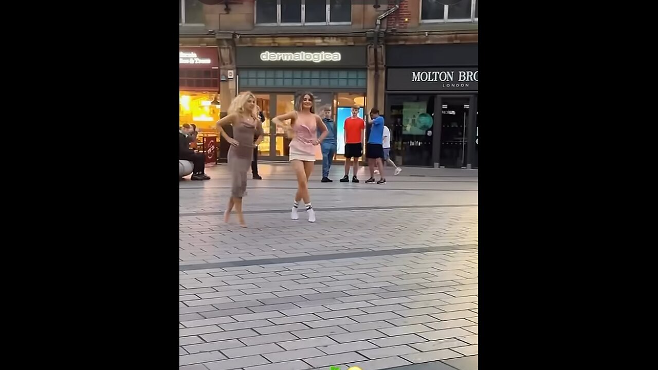 TWO BEAUTIFUL GIRLS DANCING
