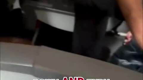 Airplane passengers jump into action to tackle and pin down man shouting "bomb the plane"